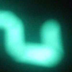 a green magnified standby light