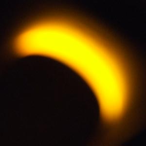 a yellow magnified standby light